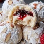 Raspberry Almond Snowball Cookies with Jam Filling – A Festive Classic with a Fruity Twist First Image