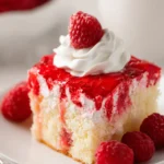 Raspberry Poke Cake With A White Cake Mix First Image